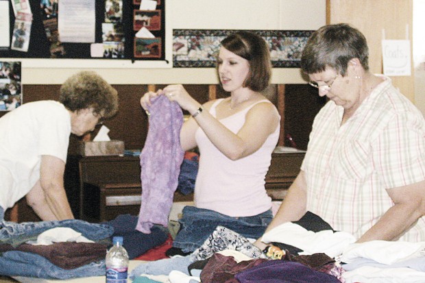 08-04-07 Tornado-reliief- 3 ladies.JPG